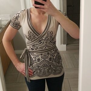 2/$10 on anything priced under $10!!! BCBGeneration cream and black fitted top